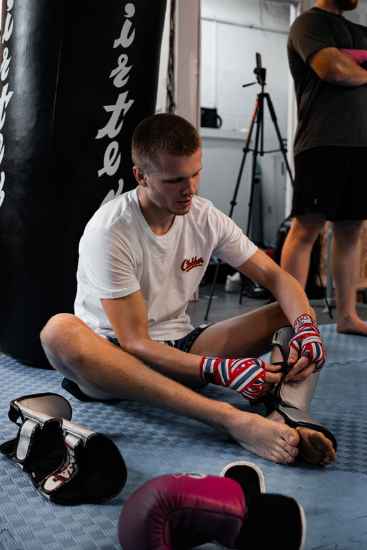 CLOBBER™ Script Tee