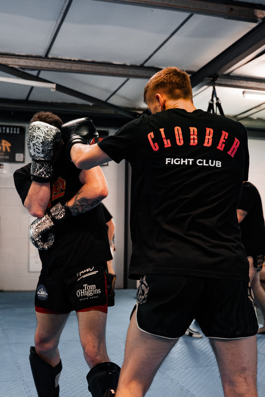 CLOBBER™ Signature Tee – Red Logo Edition